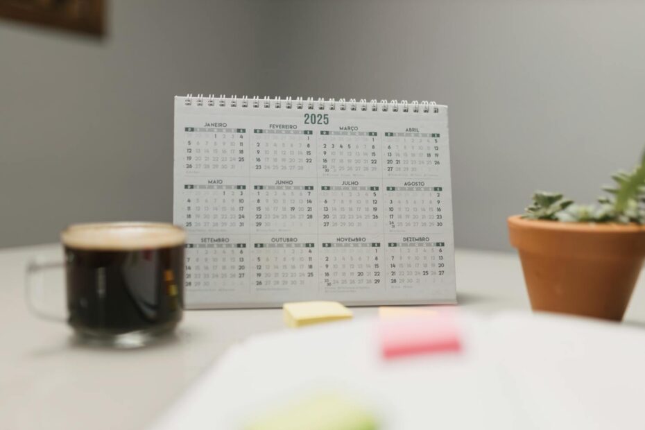 Desk calendar and a cup of coffee